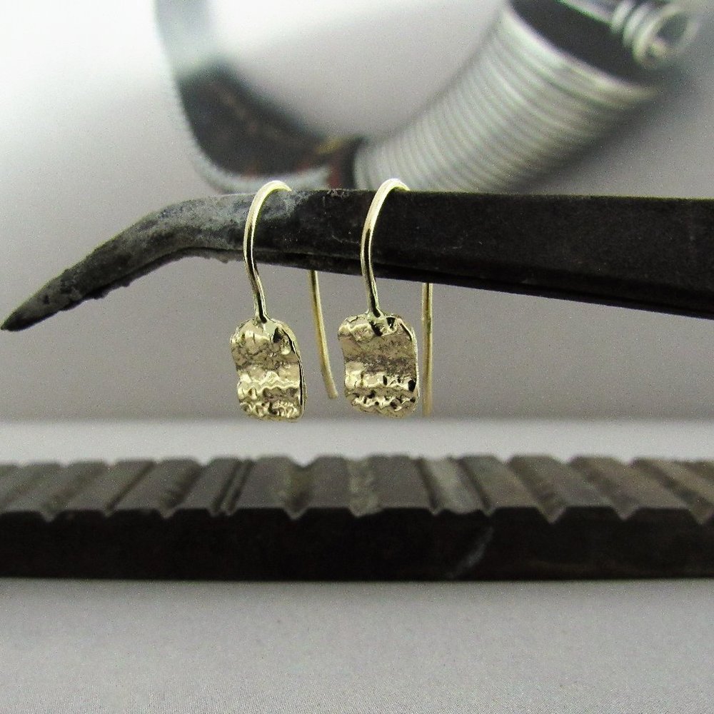 Gold earrings. 14k Yellow gold French hooks earrings, with a unique design.
